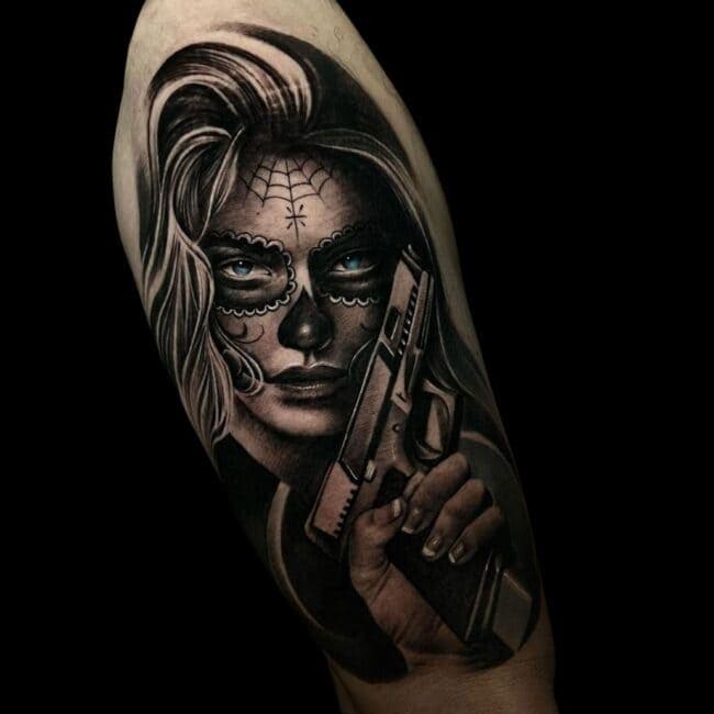 Jake Jones Tattoo Artist Realism Chicano Portrait Woman With Gun Arm Sleeve Tattoo