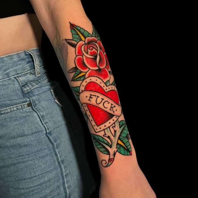 Michael Tattoo Artist Traditional Colour Floral Rose With Heart Script Forearm Tattoo