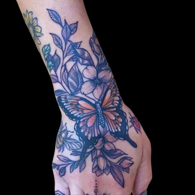 Sheela Tatoo Artist Neotraditional Colour Flowers Butterfly Hand Forearm Tattoo