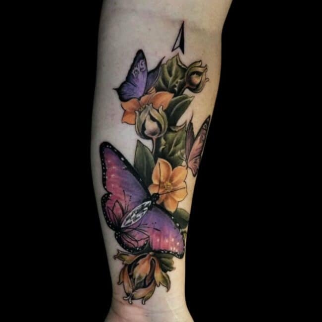 Sunny Tattoo Artist Colour Realism Butterfly Flower Forearm Tattoo